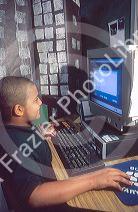 African American elementary school student working on a computer, Brandon, Florida. MR