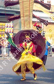 Dancers in the Notting Hill carnival in London, England parade.