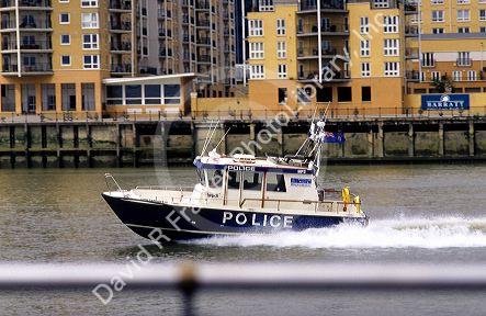 A police boat on the River Thames in London, England.