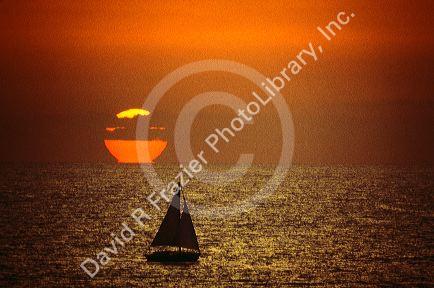 A sailboat at sunset in California.