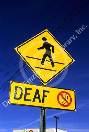 A traffic sign warning of deaf people crossing in Boise, Idaho.