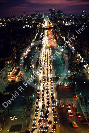 A view of the Champs Elysees taken from the Arc De Triomphe in Paris, France.