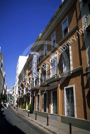 Narrow street in Seville, Spain.