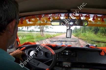 Inside public transit van across the Amazon River from Manaus, Brazil.