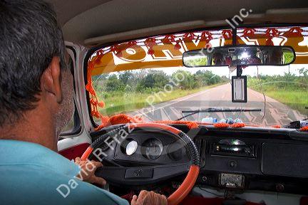 Inside public transit van across the Amazon River from Manaus, Brazil.
