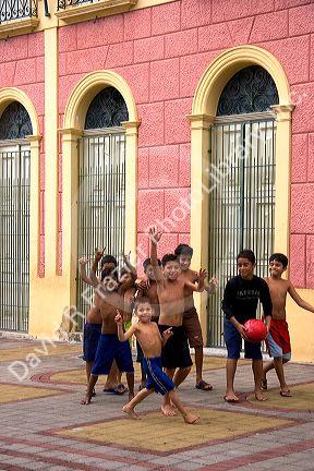 Brazilian boys play a game of street soccer in Manaus, Brazil.