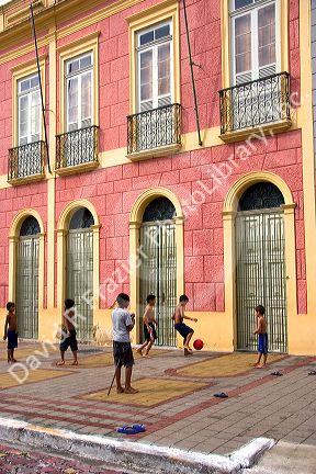Brazilian boys play a game of street soccer in Manaus, Brazil.