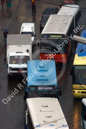 Buses and traffic in the pouring rain at Manaus, Brazil.