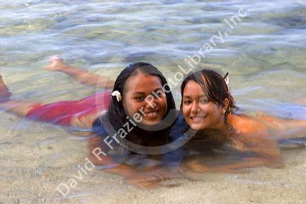 Tahitian girls in the lagoon on the island of Tahiti.