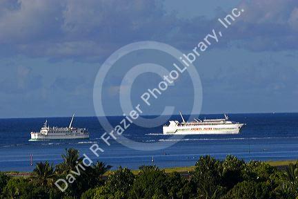 Ferry boats travel from the island of Moorea to the city of Papeete, Tahiti.