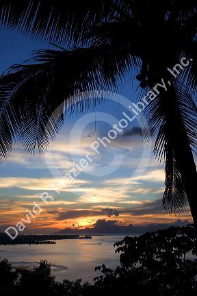 A view of Moorea at sunset taken from the island of Tahiti.