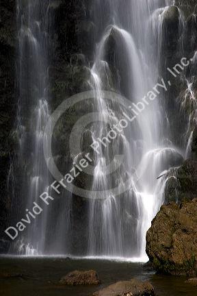 One of the Trois Cascades, a waterfall on the island of Tahiti.