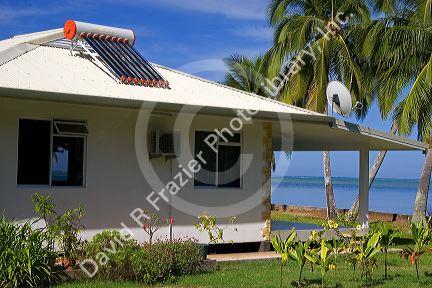 Solar water heater on the roof of a home on the island of Moorea.