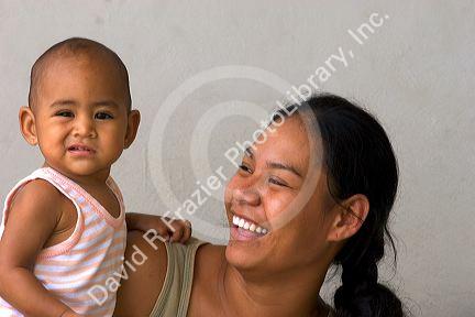 Tahitian mother and child on the island of Moorea.