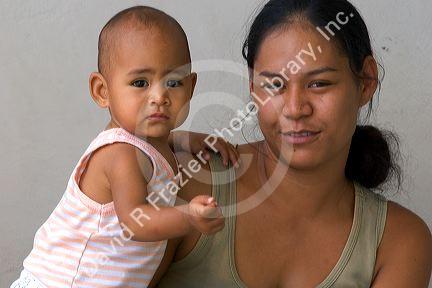 Tahitian mother and child on the island of Moorea.
