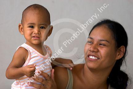 Tahitian mother and child on the island of Moorea.