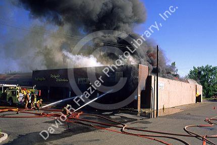 Firefighters fighting a fire at a shopping mall in Boise, Idaho.