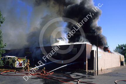 Firefighters fighting a fire at a shopping mall in Boise, Idaho.