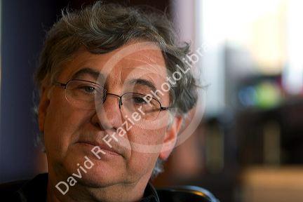 Portrait of a middle aged man wearing eyeglasses. MR