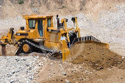 Bulldozer working at a gravel pit near Emmett, Idaho.