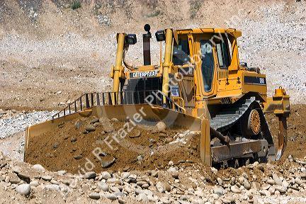 Bulldozer working in a gravel pit near Emmett, Idaho.