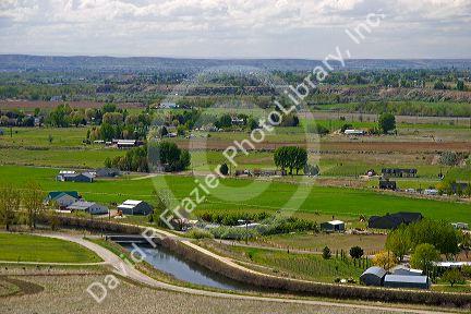 Farmland and irrigation canal in the Emmett Valley, Idaho.