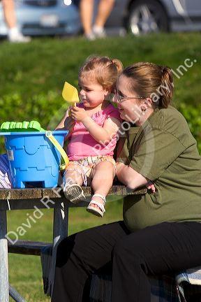 Mother and daughter interacting with eachother in Seattle, Washington.