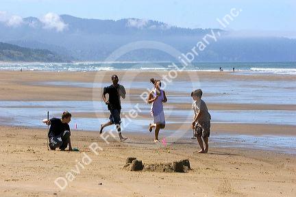 Beach golf and beach running at Pacific City on the Oregon Coast.