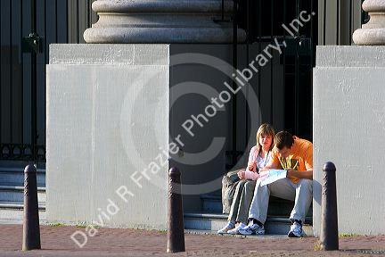 Couple reading a map at Waterloo Plein in Amsterdam, Netherlands.