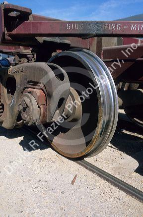 Iron wheel on a railroad car.