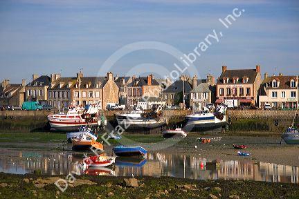 Low tide in the harbor at the village of Barfleur in the region of Basse-Normandie, France.