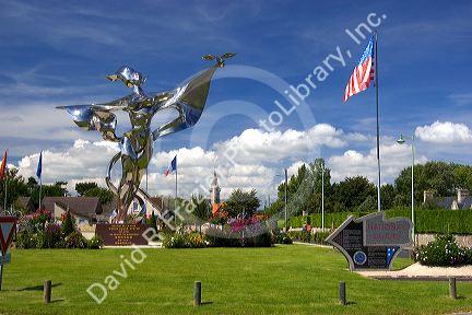 World Peace Statue and a monument to the American National Guard at Grandcamp-Maisy in the region of Basse-Normandie, France.