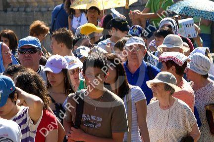 Tourists wait in a line at The Palace of Versailles at Versailles in the department of Yvelines, France.