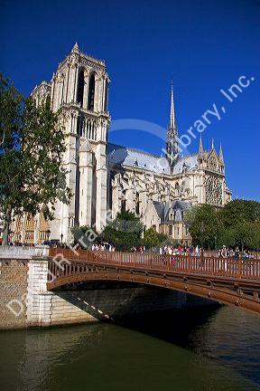 Notre Dame cathedral along the river Seine in Paris, France.