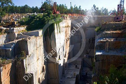 Workers drilling and cutting blocks at a granite quarry in Elberton, Georgia.