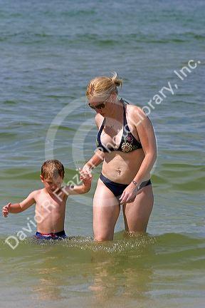Mother and son play in the water at St. Petersburg, Florida. MR