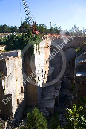 Workers drilling and cutting blocks at a granite quarry in Elberton, Georgia.