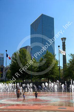 People get wet in the Fountain of Rings in Centennial Olympic Park, Atlanta, Georgia.