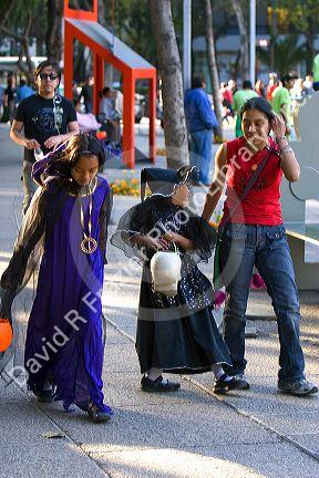 Mexican children dressed in costumes to celebrate the Day of the Dead in Mexico City, Mexico.