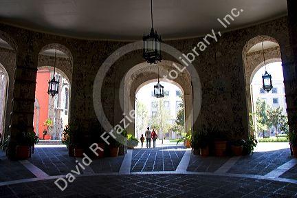 Archways frame the inner court yard at the National Palace in Mexico City, Mexico.