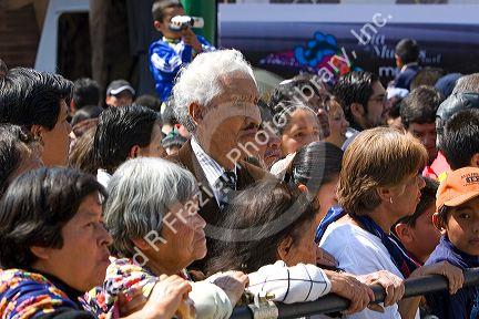 A crowd of Mexican people celebrating the Day of the Dead in the Zocalo in Mexico City, Mexico.