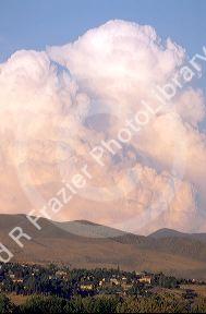 Cumulonimbus thunderstorm cloud over Boise, Idaho foothills.