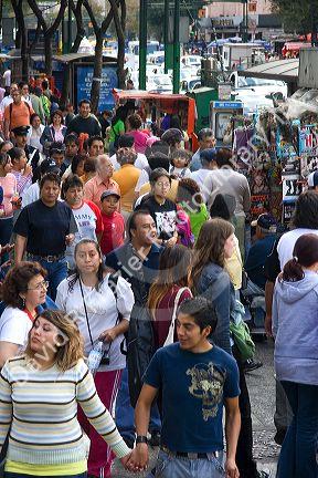 Pedestrians at the intersection of Paseo de la Reforma and Eje Central Lazaro Cardenas in Mexico City, Mexico.
