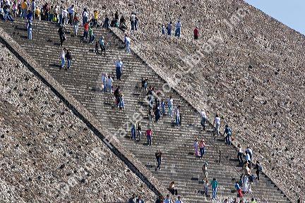 Tourists climb the steps of the Pyramid of the Sun at Teotihuacan in the State of Mexico, Mexico.