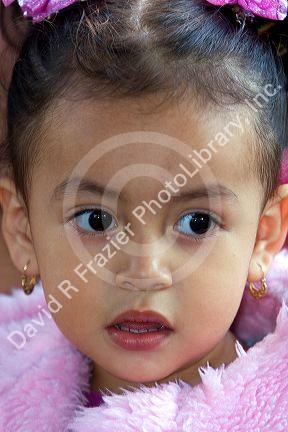 Young Mexican girl in the plaza at Taxco in the State of Guerrero, Mexico.
