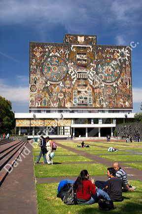 Students study in front of the Central Library on the campus of the National Autonomous University of Mexico in Mexico City, Mexico.