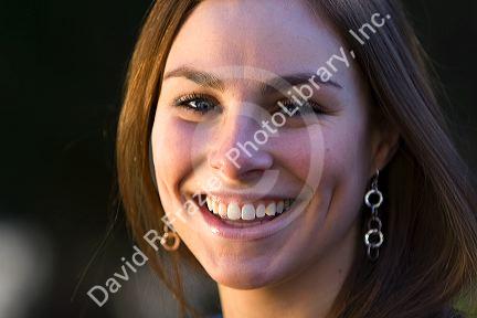 Portrait of a young woman smiling. MR