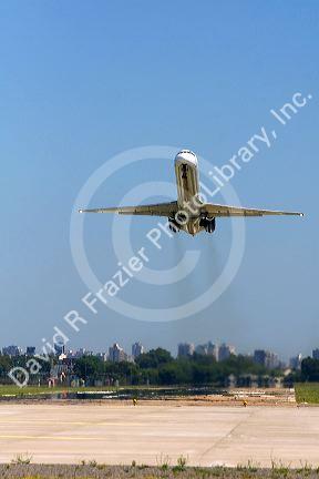 MD-80 airplane taking off from Aeroparque Metropolitano Jorge Newbery in Bueos Aires, Argentina.