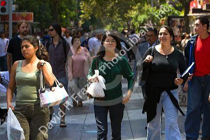 People walk on the Paseo Ahumada in Santiago, Chile.