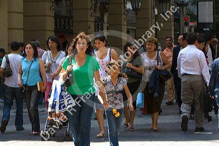 People walk on the Paseo Ahumada in Santiago, Chile.